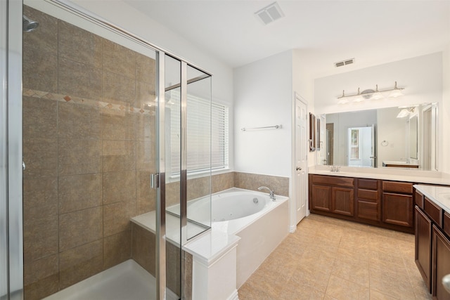 459 Bristol St, Roanoke, TX 76262 - full bath with double vanity, a shower stall, a garden tub, and healthy amount of natural light