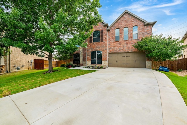 459 Bristol St, Roanoke, TX 76262 - traditional home featuring an attached garage, concrete driveway, and brick siding