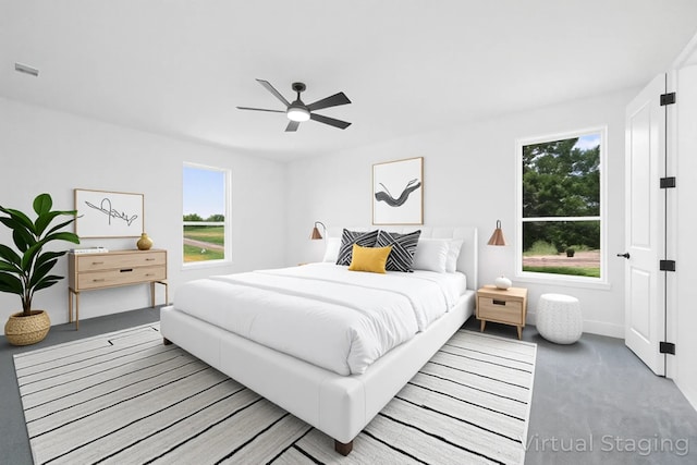 101 Crepe Myrtle, Corsicana, TX 75109 - bedroom featuring carpet, a ceiling fan, and baseboards