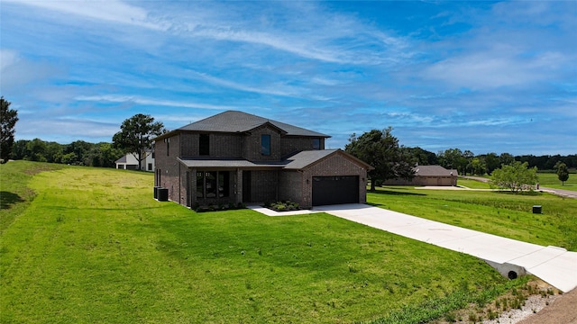 101 Crepe Myrtle, Corsicana, TX 75109 - view of front of property featuring driveway, a front yard, brick siding, and a garage