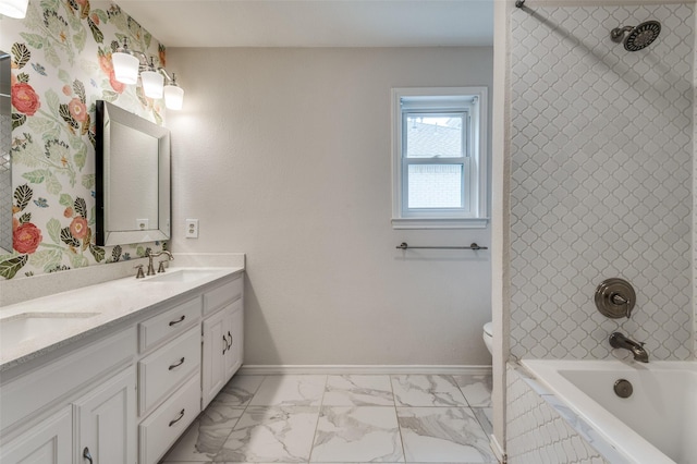 2800 Amherst Ave, University Park, TX 75225 - full bathroom featuring double vanity, marble look tiles, baseboards, toilet, and tiled shower / bath