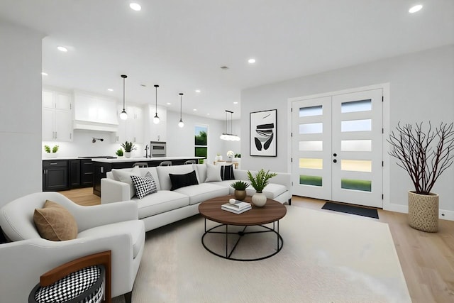 321 El Barco, Corsicana, TX 75109 - living area featuring light wood-style flooring and recessed lighting