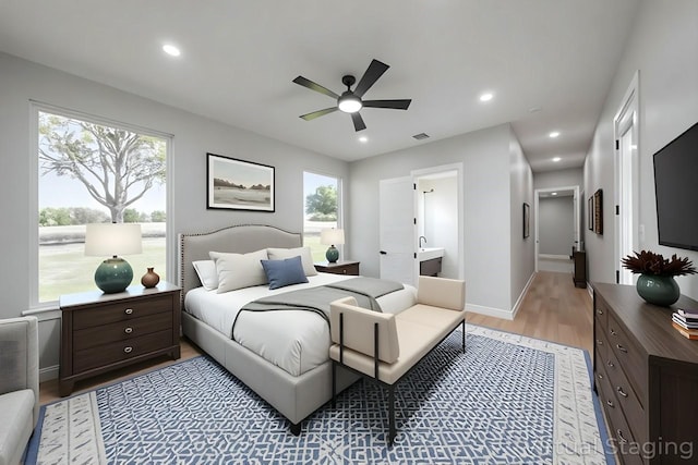 321 El Barco, Corsicana, TX 75109 - bedroom with light wood-style floors, multiple windows, baseboards, recessed lighting, and a ceiling fan