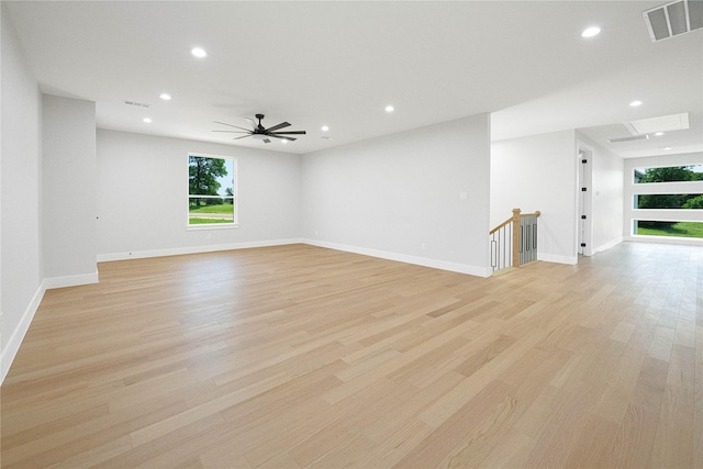 321 El Barco, Corsicana, TX 75109 - empty room with plenty of natural light, recessed lighting, light wood finished floors, and baseboards