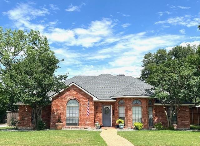 103 Shannon Dr, Allen, TX 75002 - view of front facade featuring brick siding and a shingled roof