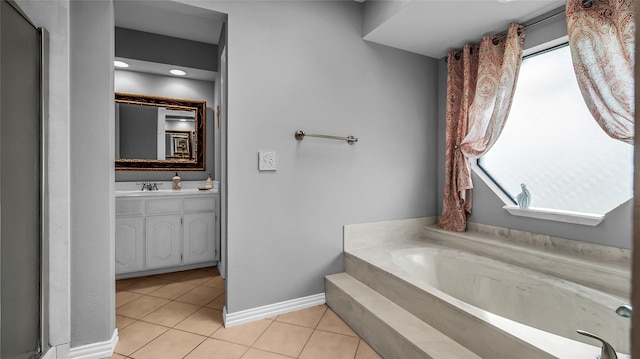 103 Shannon Dr, Allen, TX 75002 - full bathroom with vanity, tile patterned flooring, a bath, and baseboards