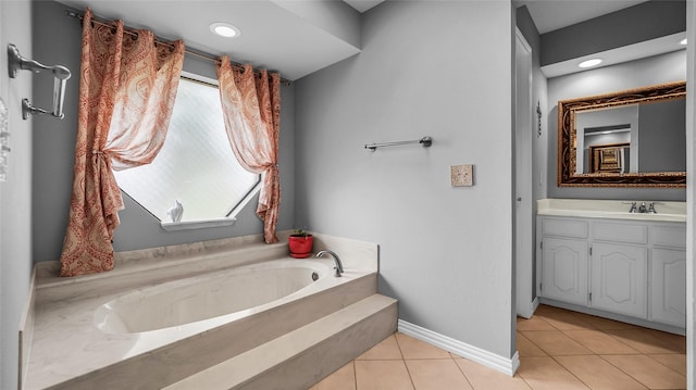 103 Shannon Dr, Allen, TX 75002 - bathroom featuring vanity, a garden tub, tile patterned flooring, and baseboards