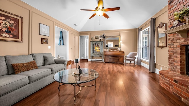 103 Shannon Dr, Allen, TX 75002 - living area with vaulted ceiling, a fireplace, ceiling fan, and wood finished floors