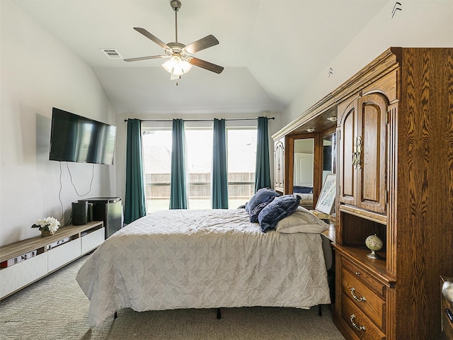 9713 Excursion Dr, Little Elm, TX 75068 - bedroom with lofted ceiling, dark colored carpet, and a ceiling fan