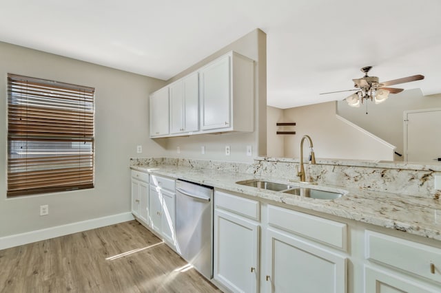 1946 Courtside Dr, Dallas, TX 75051 - kitchen featuring dishwasher, a sink, light wood-style flooring, ceiling fan, and baseboards