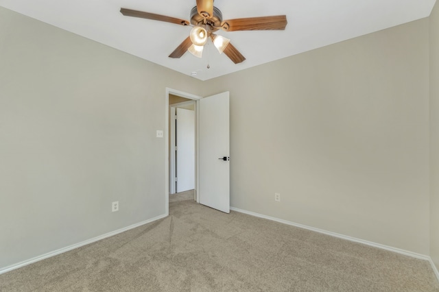 1946 Courtside Dr, Dallas, TX 75051 - spare room with light colored carpet, a ceiling fan, and baseboards