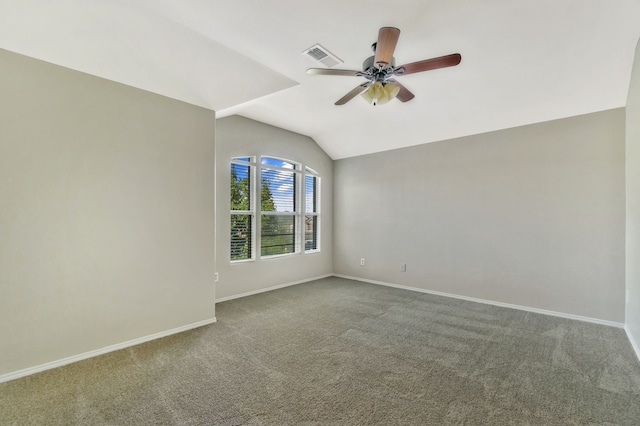 1946 Courtside Dr, Dallas, TX 75051 - spare room featuring carpet floors, ceiling fan, vaulted ceiling, and baseboards