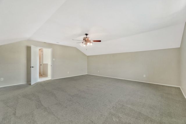 1946 Courtside Dr, Dallas, TX 75051 - additional living space with vaulted ceiling, a ceiling fan, carpet flooring, and baseboards
