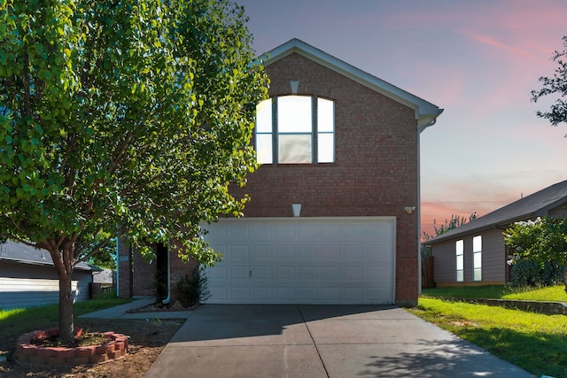 1946 Courtside Dr, Dallas, TX 75051 - view of front of house featuring brick siding, driveway, and an attached garage