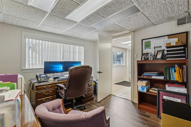 745 Buckner Blvd, Dallas, TX 75218 - office area with wood finished floors and a drop ceiling