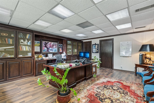 745 Buckner Blvd, Dallas, TX 75218 - office featuring wood finished floors, a drop ceiling, and baseboards