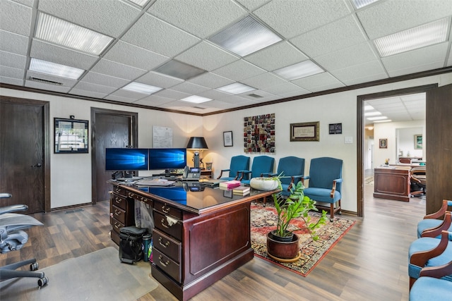 745 Buckner Blvd, Dallas, TX 75218 - office space featuring wood finished floors, crown molding, a paneled ceiling, and baseboards