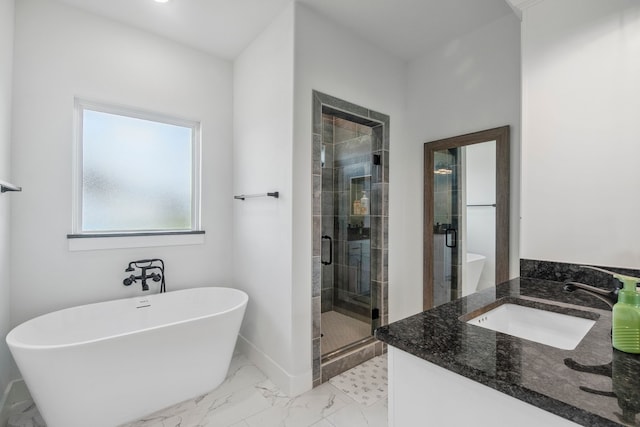 5185 Fox Trot Ln, Caddo Mills, TX 75135 - bathroom featuring a freestanding tub, vanity, marble look tile flooring, a shower stall, and baseboards