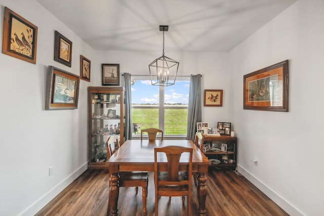 5185 Fox Trot Ln, Caddo Mills, TX 75135 - dining area with a chandelier, baseboards, and dark wood finished floors