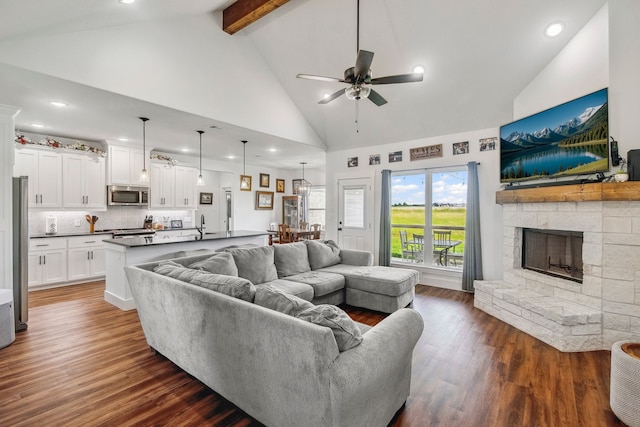 5185 Fox Trot Ln, Caddo Mills, TX 75135 - living area with high vaulted ceiling, ceiling fan, recessed lighting, dark wood-style floors, and beam ceiling