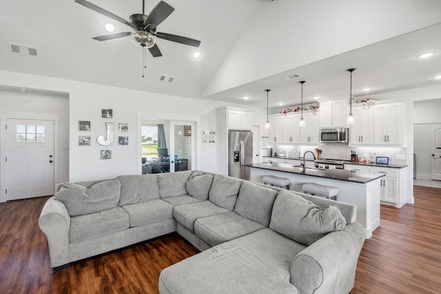 5185 Fox Trot Ln, Caddo Mills, TX 75135 - living area with ceiling fan, dark wood finished floors, recessed lighting, and high vaulted ceiling