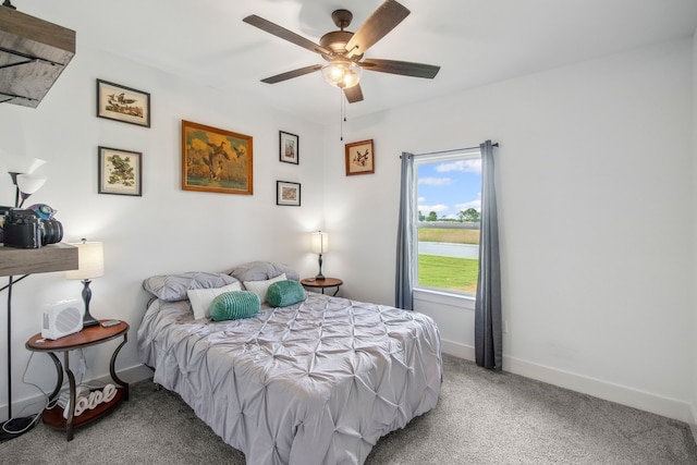5185 Fox Trot Ln, Caddo Mills, TX 75135 - carpeted bedroom with baseboards, a ceiling fan, and a water view
