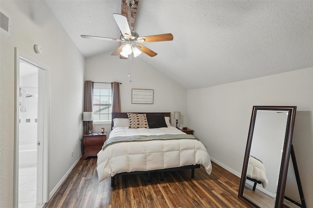 5590 Spring Valley Rd Unit C208, Dallas, TX 75254 - bedroom with vaulted ceiling, wood finished floors, a textured ceiling, baseboards, and a ceiling fan