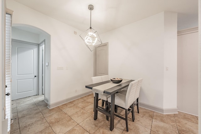 2117 Torin St, Lewisville, TX 75056 - dining area with arched walkways and baseboards