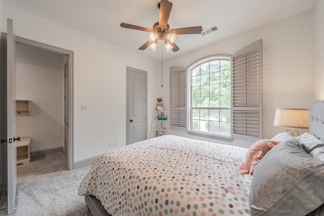 2117 Torin St, Lewisville, TX 75056 - carpeted bedroom with baseboards and a ceiling fan