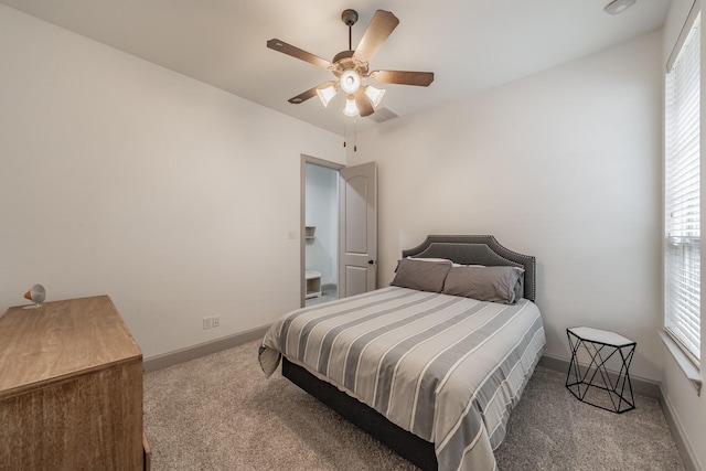 2117 Torin St, Lewisville, TX 75056 - carpeted bedroom with baseboards and ceiling fan