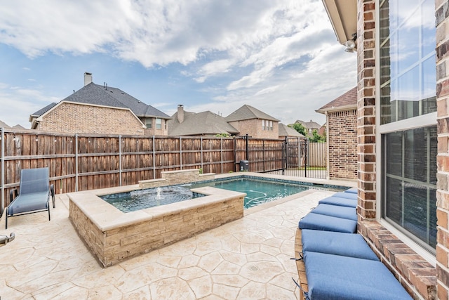 2117 Torin St, Lewisville, TX 75056 - view of pool with an in-ground hot tub, a patio, a fenced backyard, and a residential view