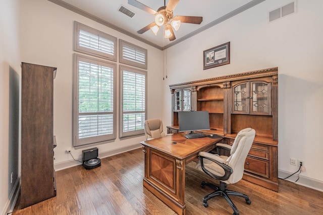 2117 Torin St, Lewisville, TX 75056 - office with ceiling fan, baseboards, crown molding, hardwood / wood-style floors, and a towering ceiling