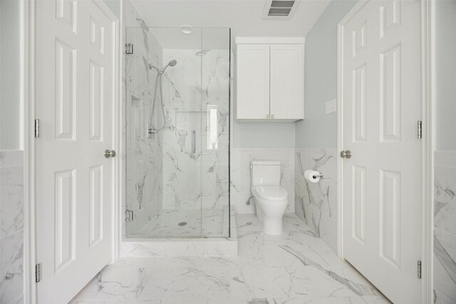 15810 Ranchita Dr, Dallas, TX 75248 - full bath with toilet, a marble finish shower, tile walls, marble finish floors, and a wainscoted wall