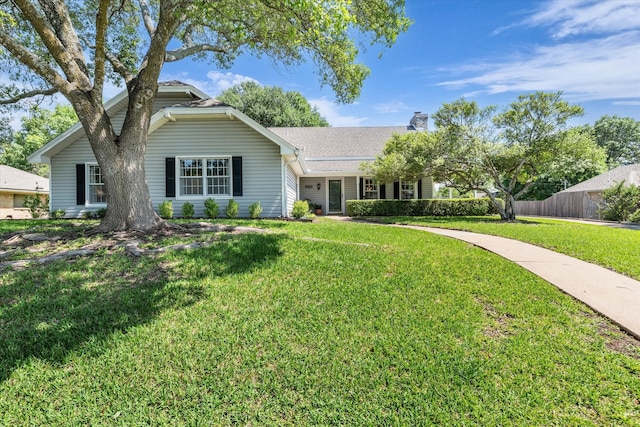 13734 Riverview Dr, Woodway, TX 76712 - view of front facade with a chimney, a front lawn, and roof with shingles