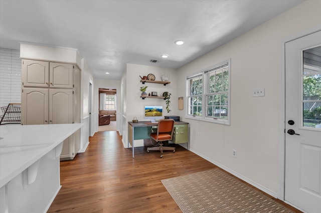 13734 Riverview Dr, Woodway, TX 76712 - home office with wood finished floors, recessed lighting, and baseboards