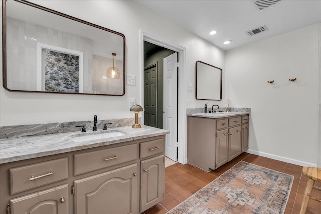 13734 Riverview Dr, Woodway, TX 76712 - full bathroom featuring two vanities, tile patterned flooring, and recessed lighting