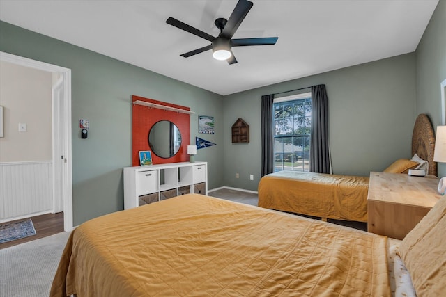13734 Riverview Dr, Woodway, TX 76712 - bedroom with a ceiling fan and wood finished floors