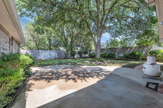 13734 Riverview Dr, Woodway, TX 76712 - fenced backyard with a patio