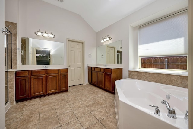 3532 Gallant Trl, Fort Worth, TX 76244 - full bath with a garden tub, two vanities, a shower stall, vaulted ceiling, and tile patterned floors
