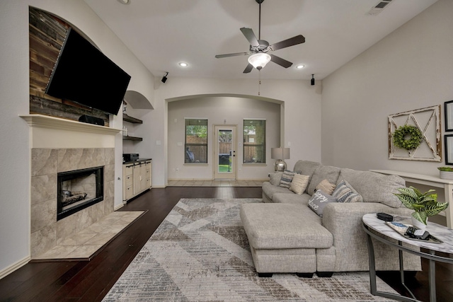 3532 Gallant Trl, Fort Worth, TX 76244 - living area featuring a ceiling fan, wood-type flooring, a tiled fireplace, recessed lighting, and baseboards