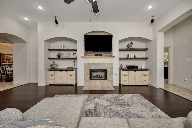 3532 Gallant Trl, Fort Worth, TX 76244 - living room with a ceiling fan, a fireplace, wood finished floors, recessed lighting, and baseboards