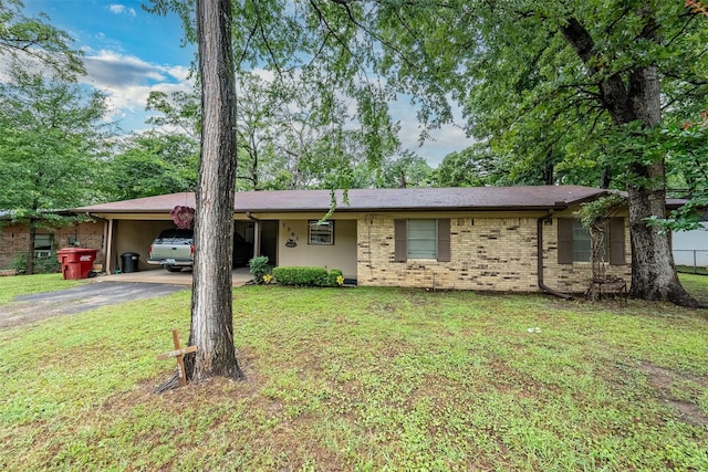 1361 Shady Ln, Canton, TX 75103 - ranch-style home featuring asphalt driveway, a carport, a front yard, and brick siding