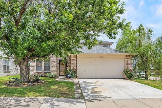 2701 Peach Dr, Little Elm, TX 75068 - view of front of home featuring a garage, brick siding, concrete driveway, and a shingled roof