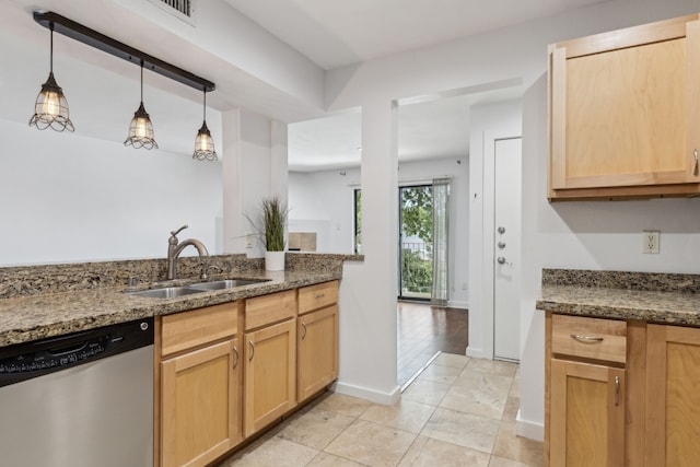 4777 Cedar Springs Rd Unit 6N, Dallas, TX 75219 - kitchen with stainless steel dishwasher, a sink, light brown cabinets, and dark stone counters