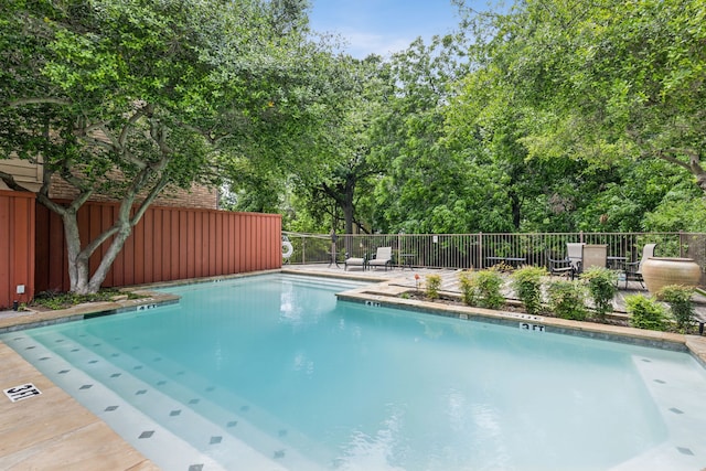 4777 Cedar Springs Rd Unit 6N, Dallas, TX 75219 - community pool featuring a patio