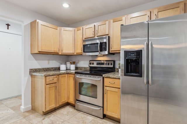 4777 Cedar Springs Rd Unit 6N, Dallas, TX 75219 - kitchen with appliances with stainless steel finishes, light brown cabinets, recessed lighting, stone countertops, and light tile patterned floors