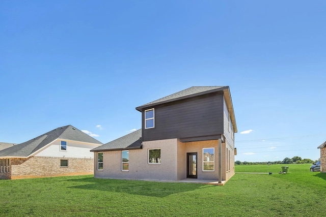 1005 Springfield Dr, Springtown, TX 76082 - rear view of property featuring a yard, a patio area, and a shingled roof