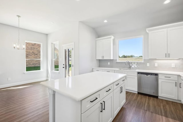 1005 Springfield Dr, Springtown, TX 76082 - kitchen featuring dishwasher, a sink, dark wood finished floors, decorative backsplash, and recessed lighting