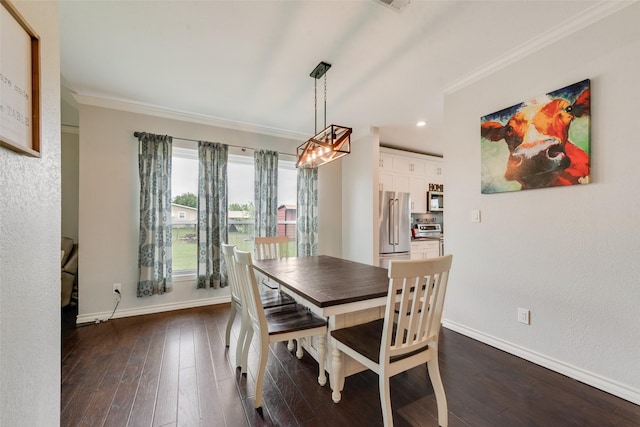 15393 Armstrong Rd, Terrell, TX 75160 - dining area featuring crown molding, dark wood-style flooring, baseboards, a chandelier, and recessed lighting