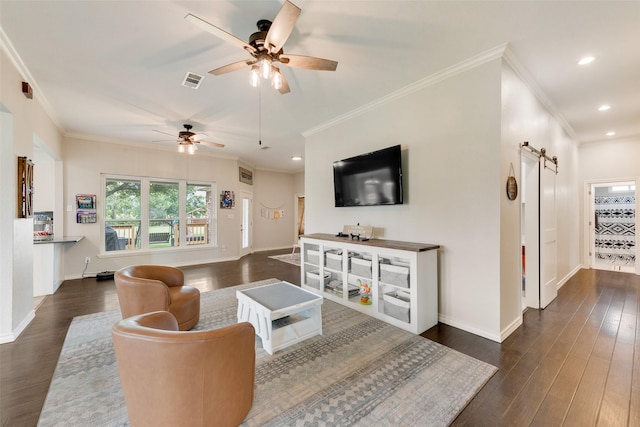 15393 Armstrong Rd, Terrell, TX 75160 - living room featuring a barn door, ceiling fan, dark wood-style floors, baseboards, and crown molding